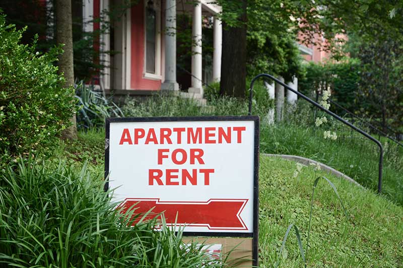 professional property management: apartment for rent sign